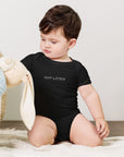 Baby short sleeve bodysuit in black with "Nap Later" text, front view.