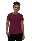 Boys' essential lightweight t-shirt in burgundy, front view.