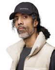 Unisex Classic baseball cap in dark gray with embroidered WHATEVR logo, front view