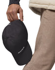 Unisex Classic baseball cap in dark gray with embroidered WHATEVR logo, side view