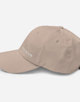 Unisex Classic baseball cap in beige with embroidered WHATEVR logo, side view