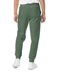 Men's essential relaxed sweatpants in green, back view.