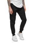 Men's essential slim fit sweatpants in black, front view.