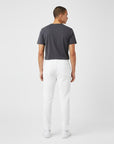 Men's essential slim fit sweatpants in white, back view.