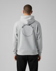 Men's premium heavyweight hoodie in ash heather with "Confidence Worn" text, back view.