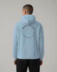 Men's premium heavyweight hoodie in blue with "Confidence Worn" text, back view.