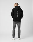 Men's premium heavyweight hoodie in black with "WHATEVR" text, back view.