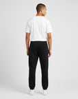 Men's heavyweight fleece sweatpants in black, back view.