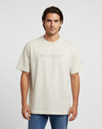 Men's premium heavyweight oversized t-shirt in beige with embroidered detailing, front view