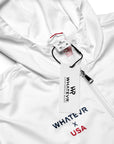 White jacket with 'Whatevr x USA' branding and a tag on a white background