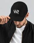 Unisex Signature trucker hat in black with embroidered WR logo, front view