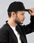 Unisex Signature trucker hat in black with embroidered WR logo, side view