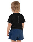 Toddler t-shirt in black with "WHATEVR" text, back view.