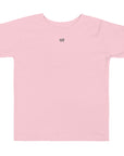 Toddler t-shirt in pink with "WR" logo, front view.