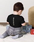Toddler t-shirt in black with "WHATEVR" text, back view.