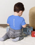 Toddler t-shirt in blue with "WHATEVR" text, back view.