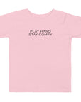 Toddler t-shirt in pink with "Play Hard Stay Comfy" text, front view.