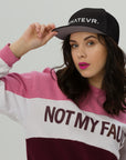 Unisex Unbothered snapback hat in black with embroidered WHATEVR text, front view