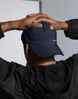 Unisex Classic baseball cap in blue with WHATEVR logo, front view