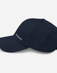 Unisex Classic baseball cap in blue with WHATEVR logo, side view