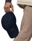 Unisex Classic baseball cap in blue with WHATEVR logo, side view