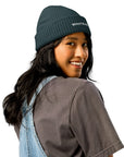 Unisex WHATEVR beanie in blue with embroidered detailing, front view