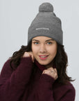 Unisex Signature pom pom knit beanie in gray with embroidered WHATEVR text, front view