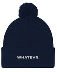 Unisex Signature pom pom knit beanie in blue with embroidered WHATEVR text, front view
