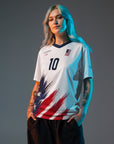 Person wearing a sports jersey with American flag design on a gray background