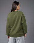 Women's premium sweatshirt in green, back view