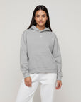Women's premium heavyweight hoodie in ash heather, front view.