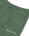 Women's essential relaxed sweatpants in green with embroidered detailing, front view.
