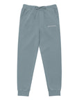 Women's essential relaxed sweatpants in light blue with embroidered detailing, front view.