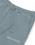 Women's essential relaxed sweatpants in light blue with embroidered detailing, front view.