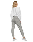 Women's essential slim fit sweatpants in grey, back view.