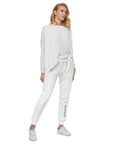 Women's essential slim fit sweatpants in white, front view.