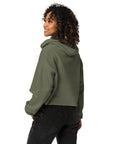 Women's cropped hoodie in green, side view.