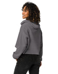 Women's cropped hoodie in grey, side view.