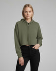 Women's cropped hoodie in green with "WR" logo, front view.