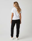 Women's premium heavyweight sweatpants in black, back view.