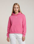 Women's premium heavyweight hoodie in pink with "WR" logo, front view.