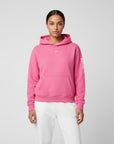 Women's premium heavyweight hoodie in pink with "WR" logo, front view.