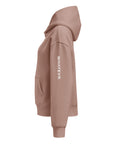 Women's premium heavyweight hoodie in taupe with "WHATEVR" text, side view.