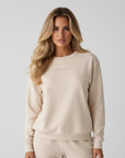 Women's premium sweatshirt in beige, front view