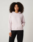 Women's premium heavyweight hoodie in pink with "WR" logo, front view.