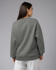 Women's premium crewneck sweatshirt in grey with embroidered detailing, back view