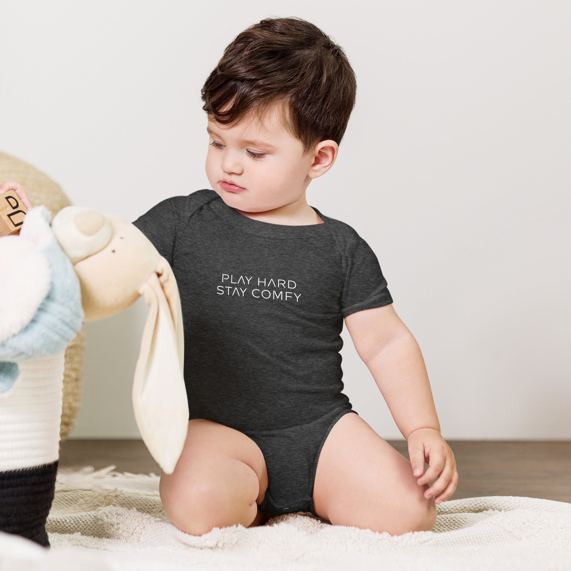 Baby short sleeve bodysuit in gray heather with "Play Hard Stay Comfy" text, front view.