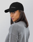 Unisex Classic baseball cap in black with embroidered WHATEVR logo, front view
