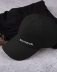 Unisex Classic baseball cap in black with embroidered WHATEVR logo, front view