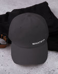Unisex Classic baseball cap in dark gray with embroidered WHATEVR logo, front view